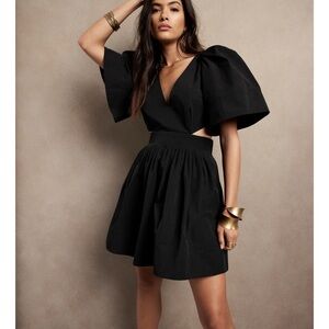 Banana republic Black Petite cut out Dress puff sleeves, with pockets.